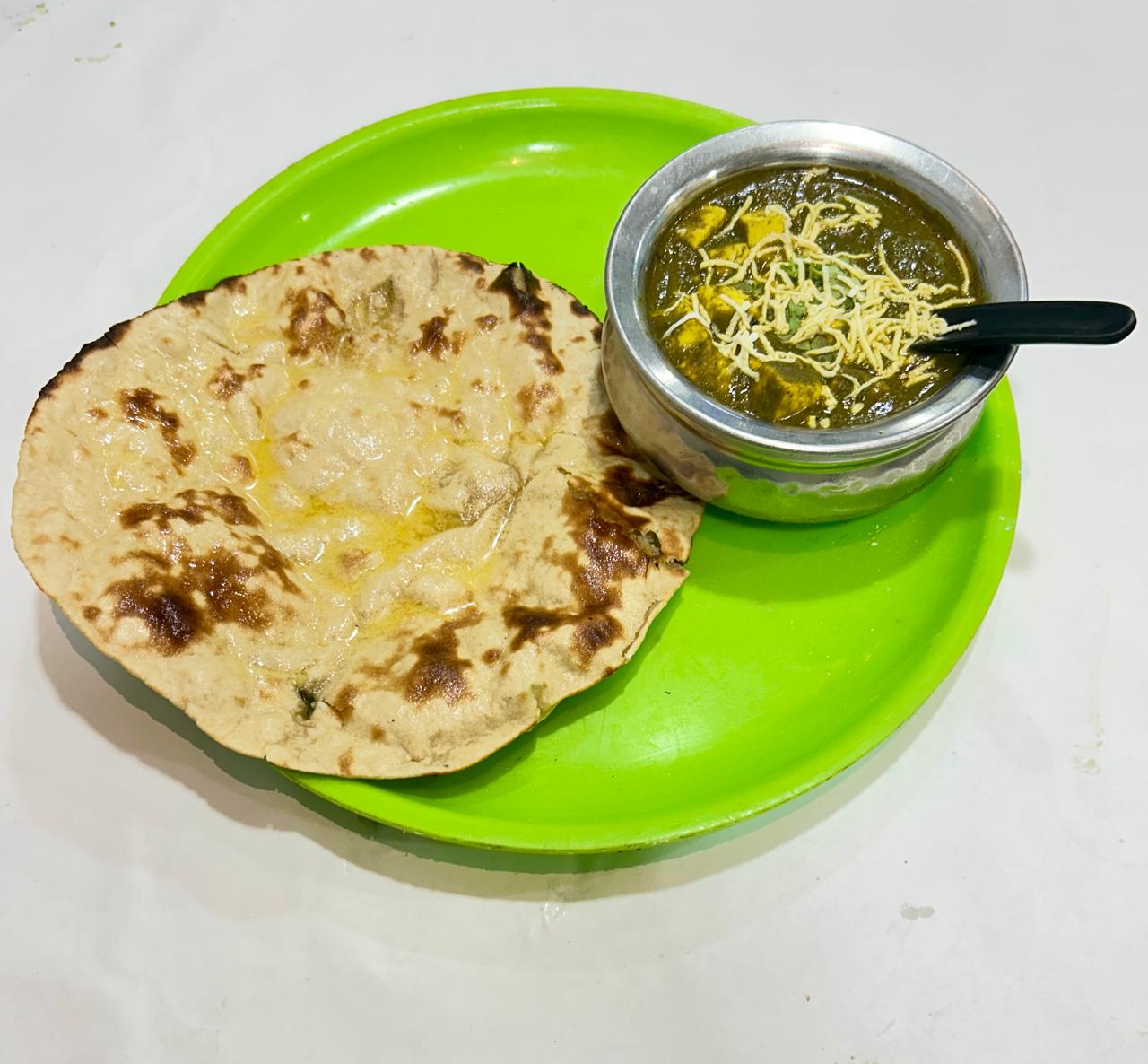 Butter naan served with signature gravy